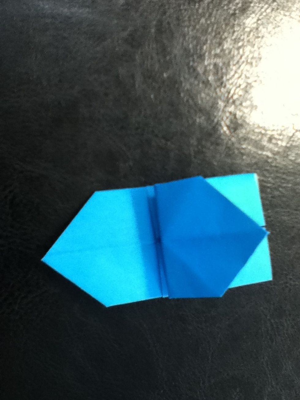 Fold the tip down and crease well.