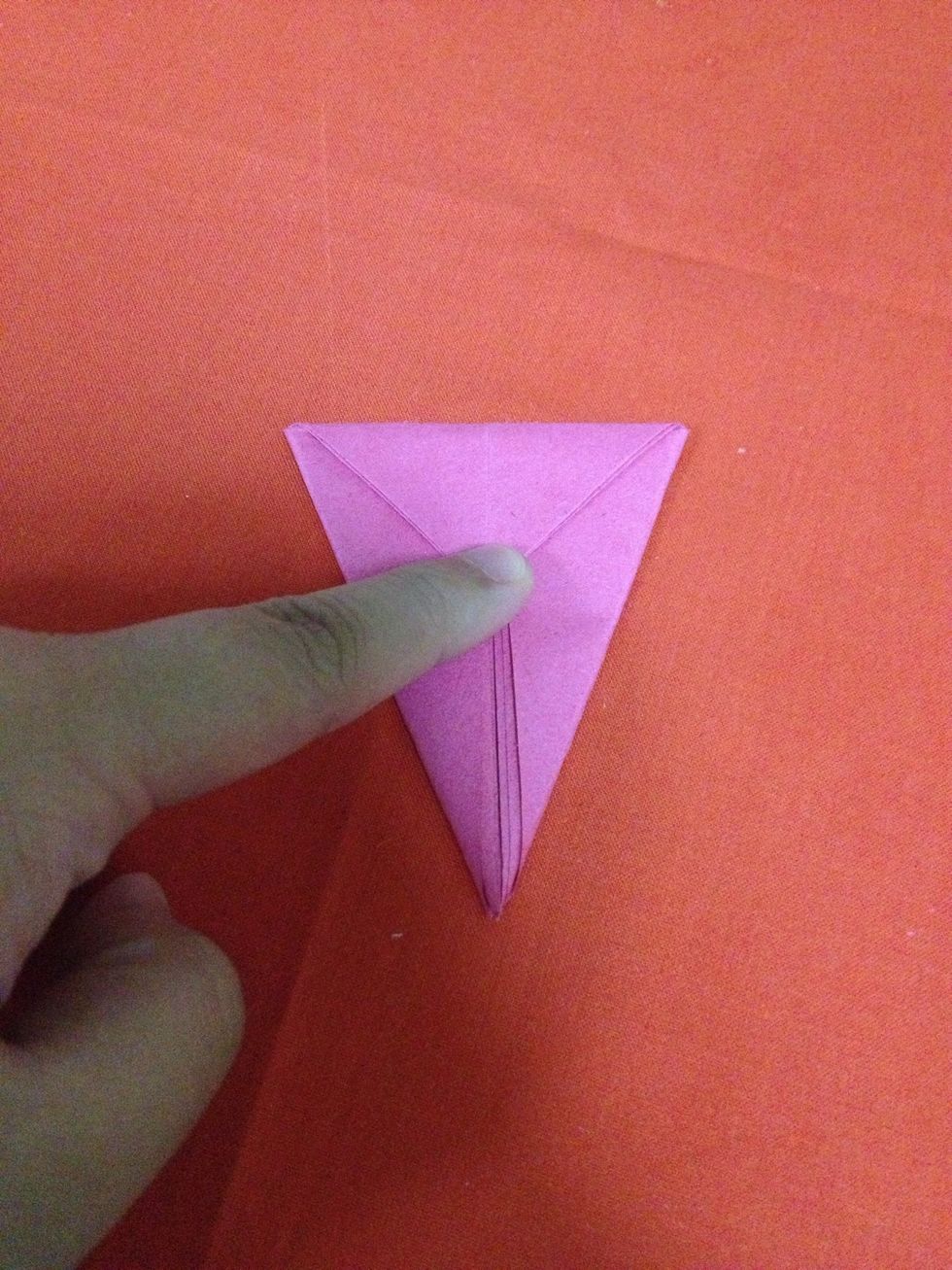 Fold the tip downward.