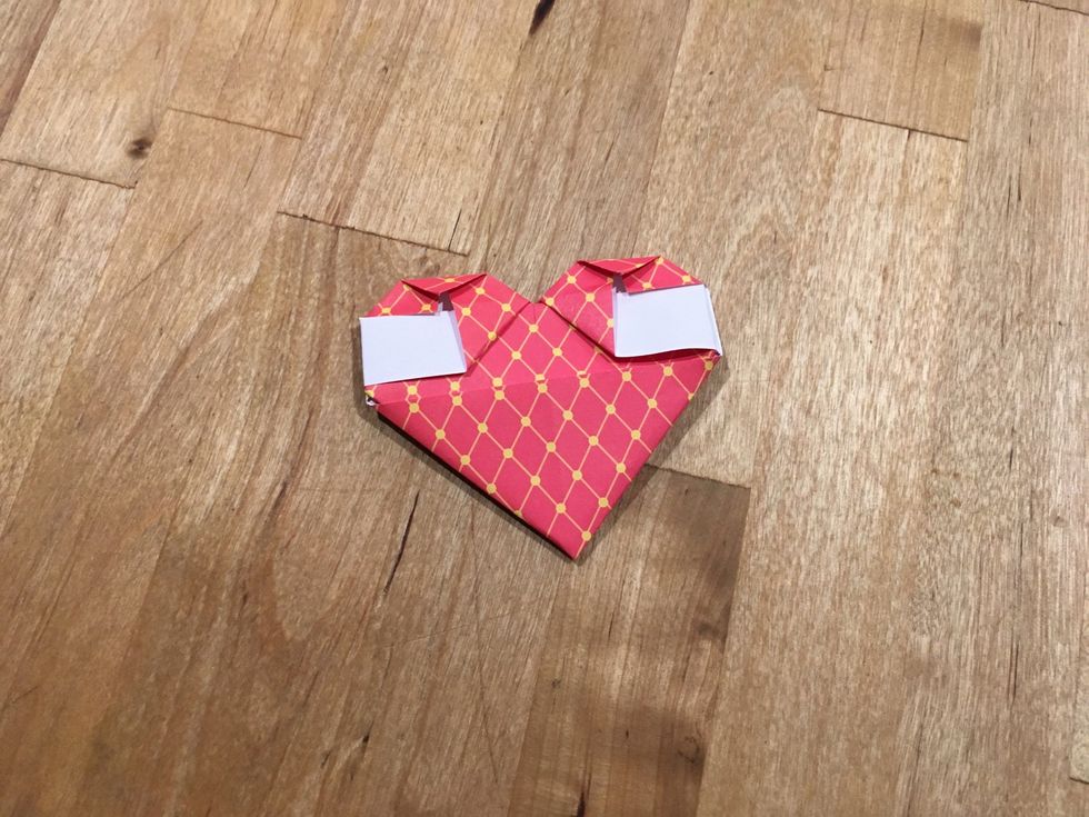 Fold the told of the rectangle to the body of the heart