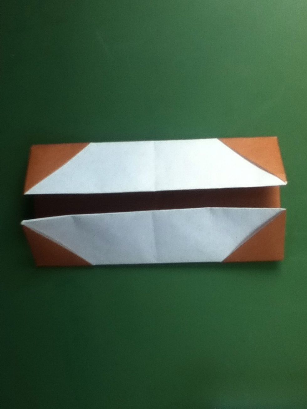 Fold the top and bottom horizontal edges to the center