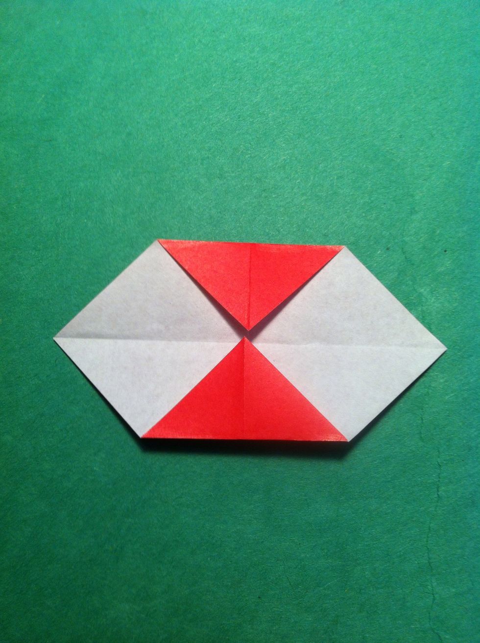 Fold the top & bottom tips to the center.