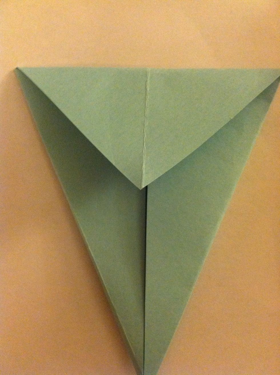 Fold the top down as far as it will go.