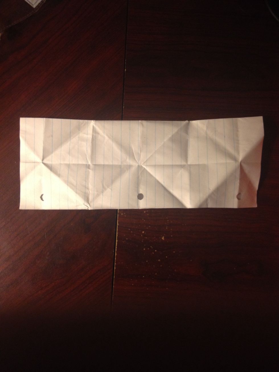 Fold the top half of the sheet down as shown