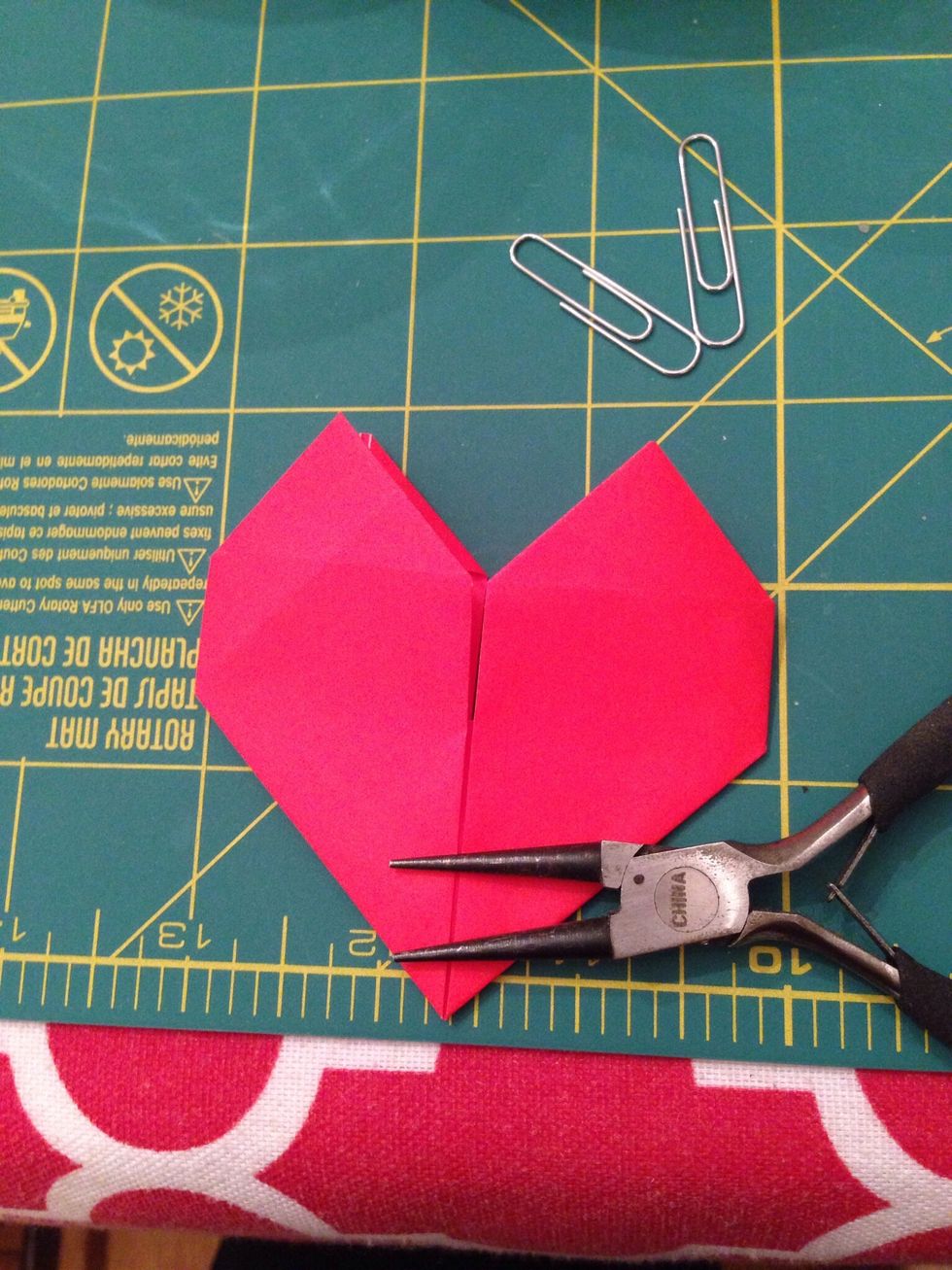 Fold the top layer of both points down.