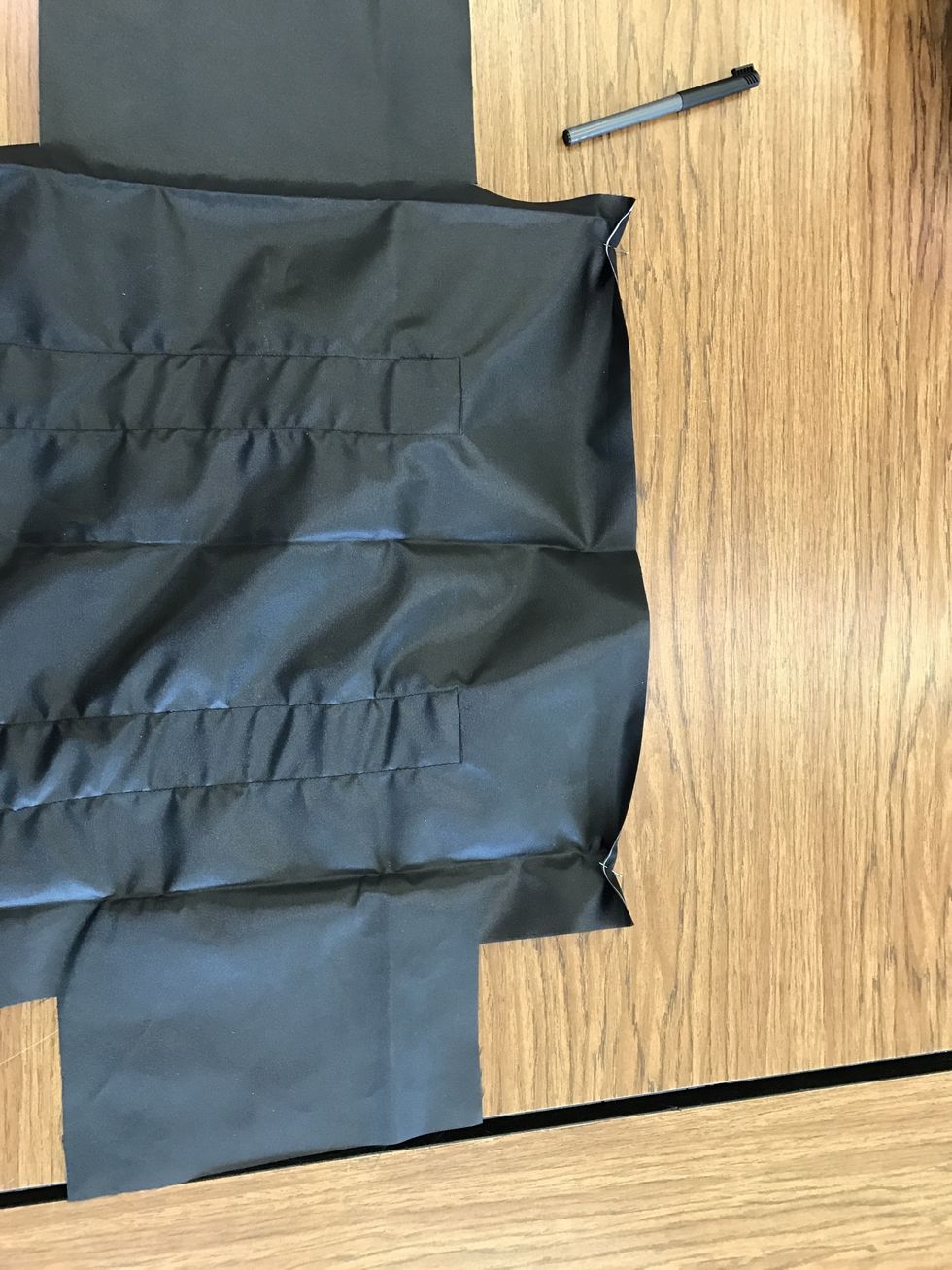 Fold the top of the bag from N-M over 1/2" and pin.