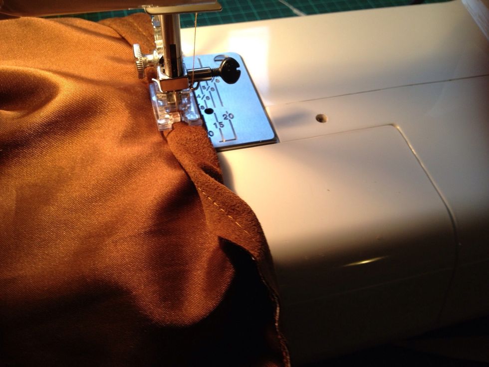 Fold the top over an inch or so and sew it to make a nice top border.