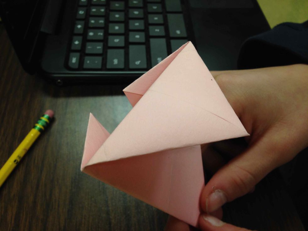 Fold the top part back.