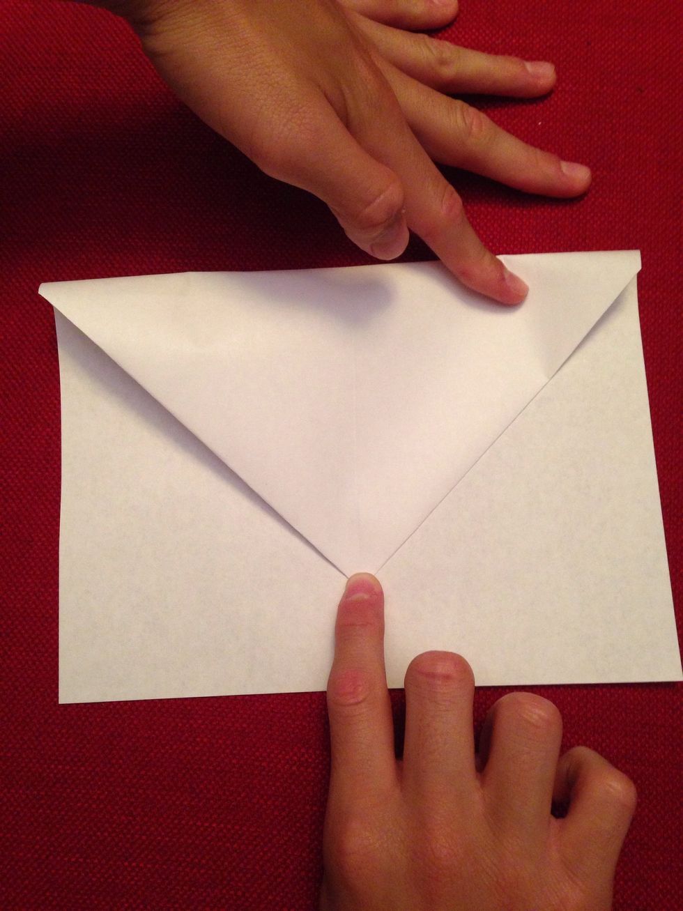 Fold the top part down to the middle and it should end up like this!