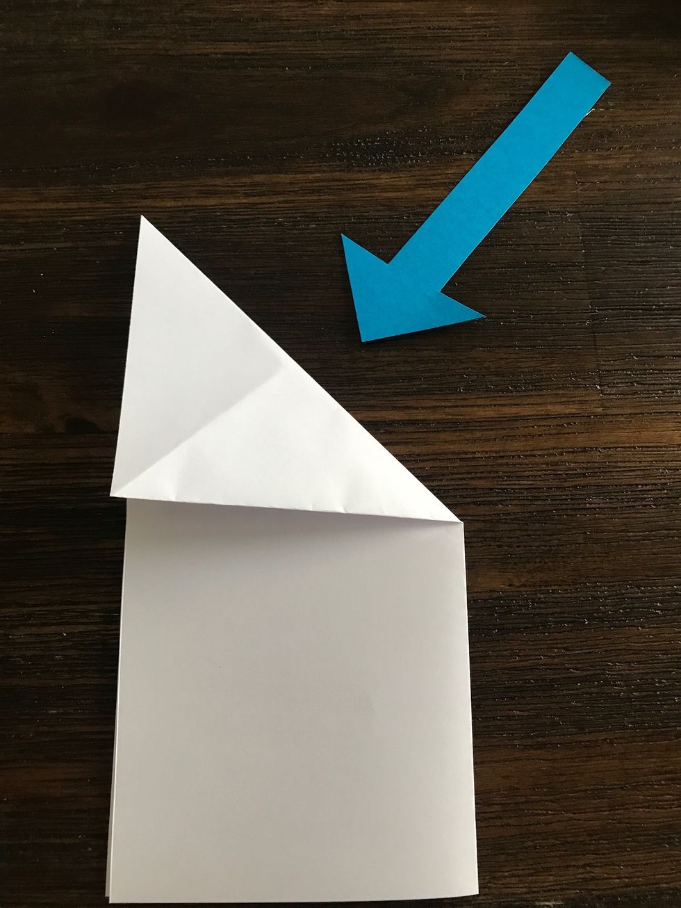 Fold the top right hand corner of your paper down.