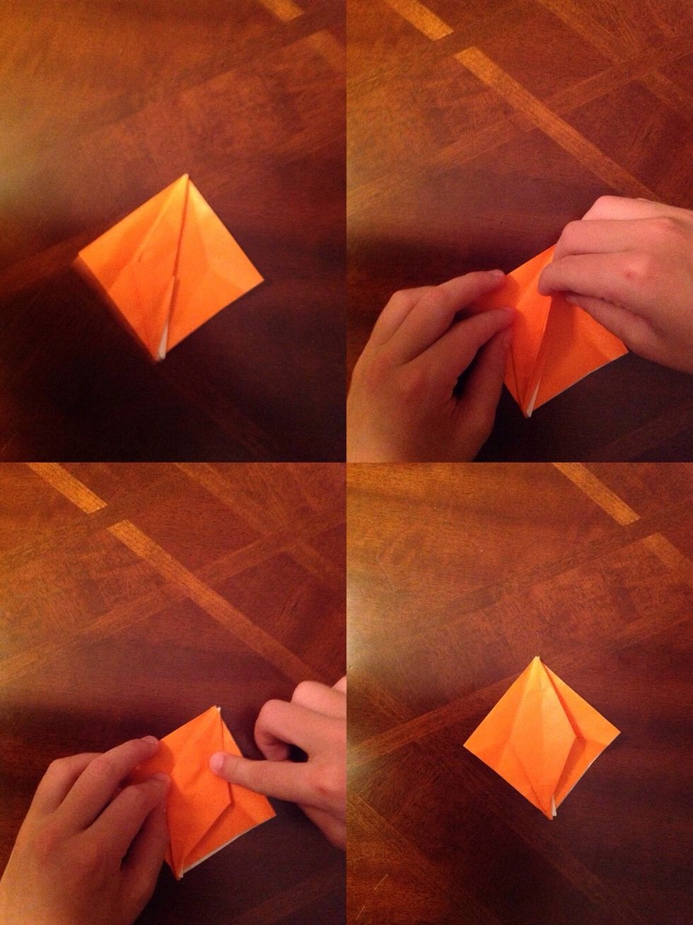 Fold the top small flap on the left side over to the right. Now your paper should have a diamond inside a square.