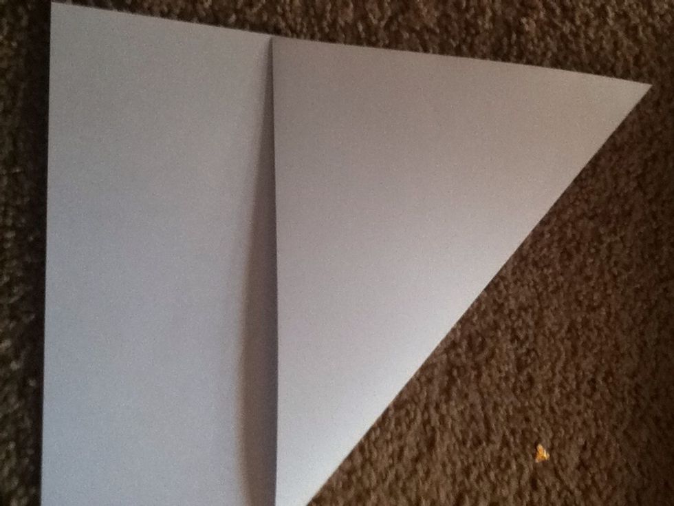 Fold the top to make a triangle