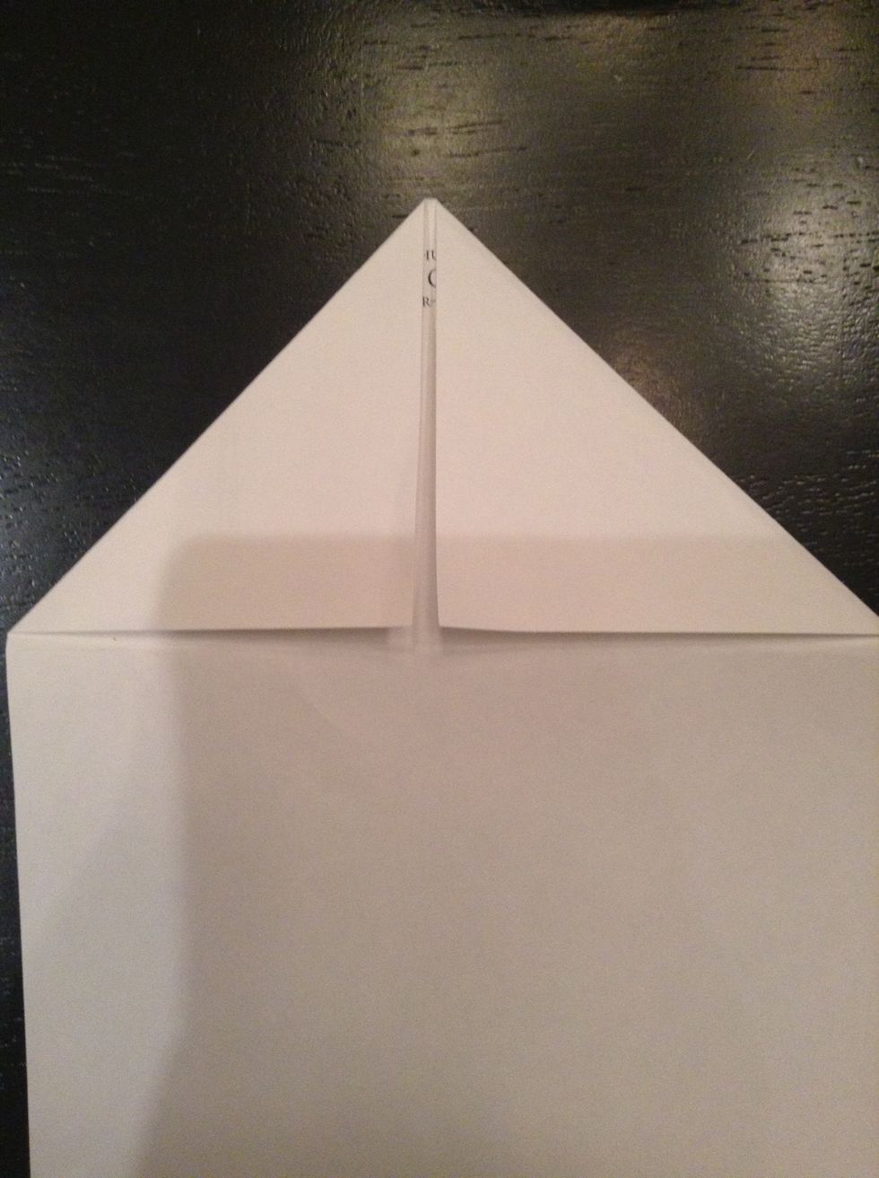 Fold the top two corners down