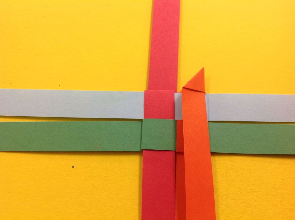 Fold the triangle in half.