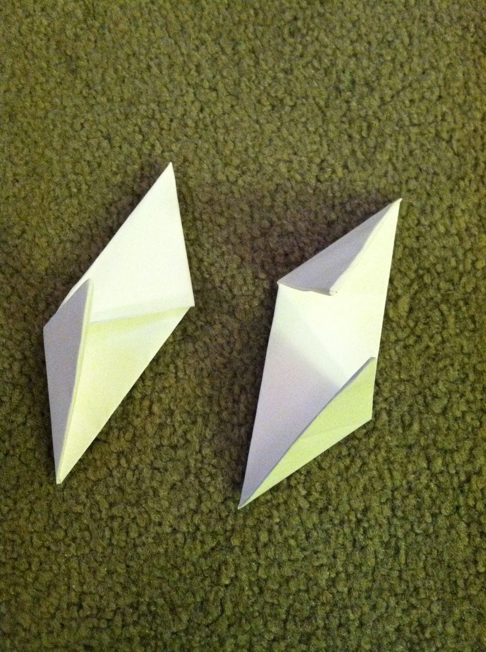 Fold the triangles inward so it holds it's shape.