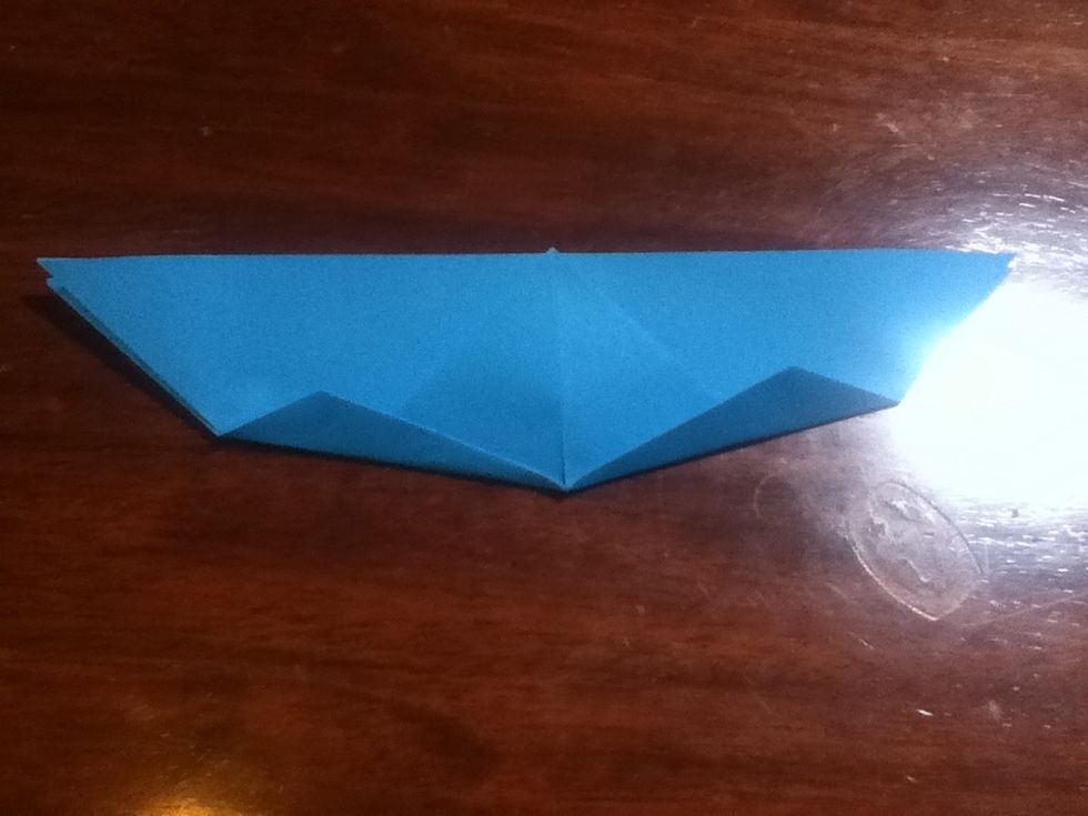 Fold the two corners up a little as shown