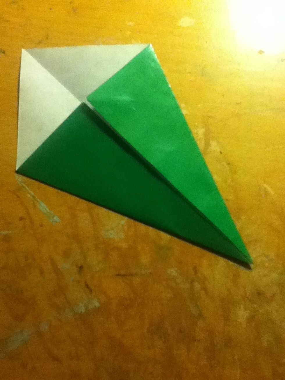 Fold the two edges to the middle crease