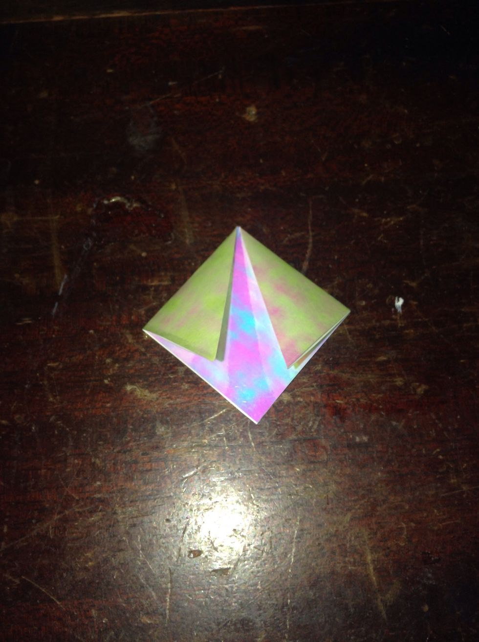 Fold the two edges to the open point.