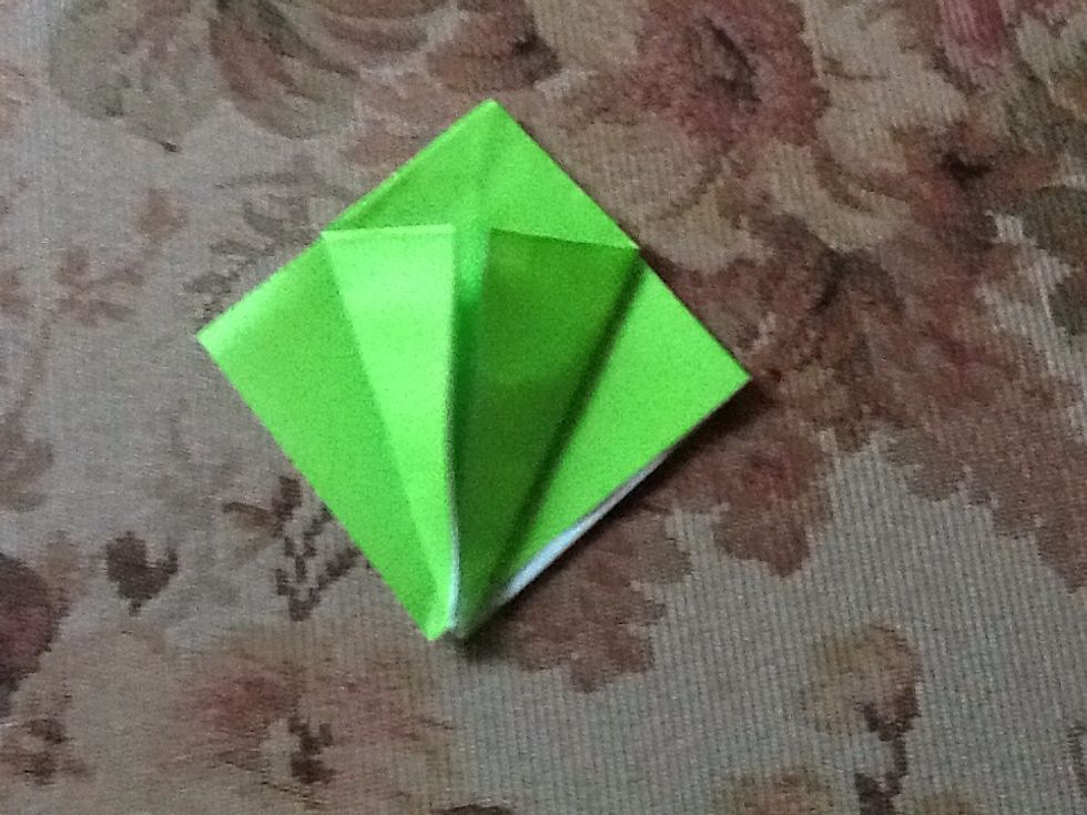 Fold the two front flaps to the center fold line. Make sure that it looks like the picture.