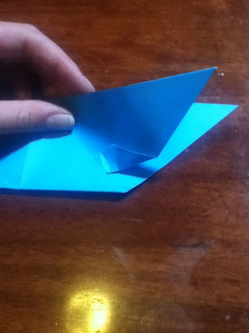 Fold the uppermost flap down as far as it can go