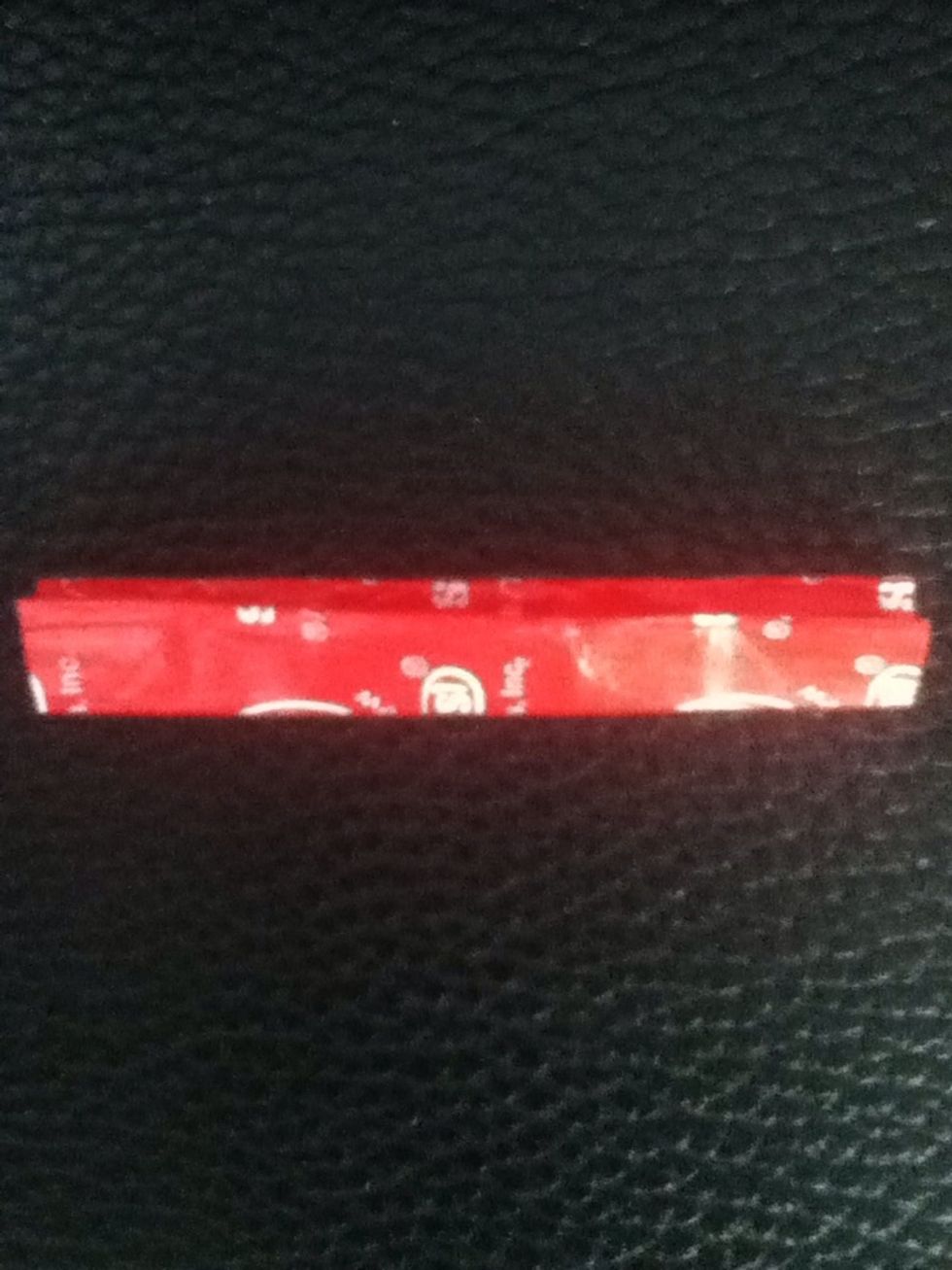 Fold the whole thing in half, making sure that the flaps are on the INSIDE.