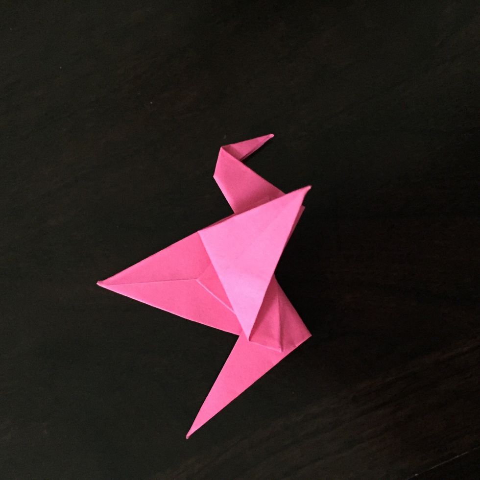 Fold the wings to make it look like a crane.