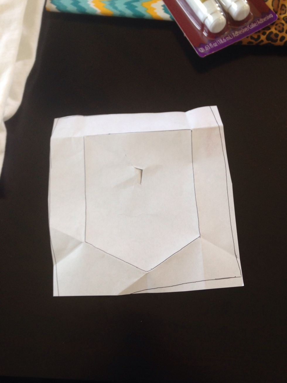 Fold them and make creases. Make sure when you cut it out make a rim around it so you can fold the sides In later