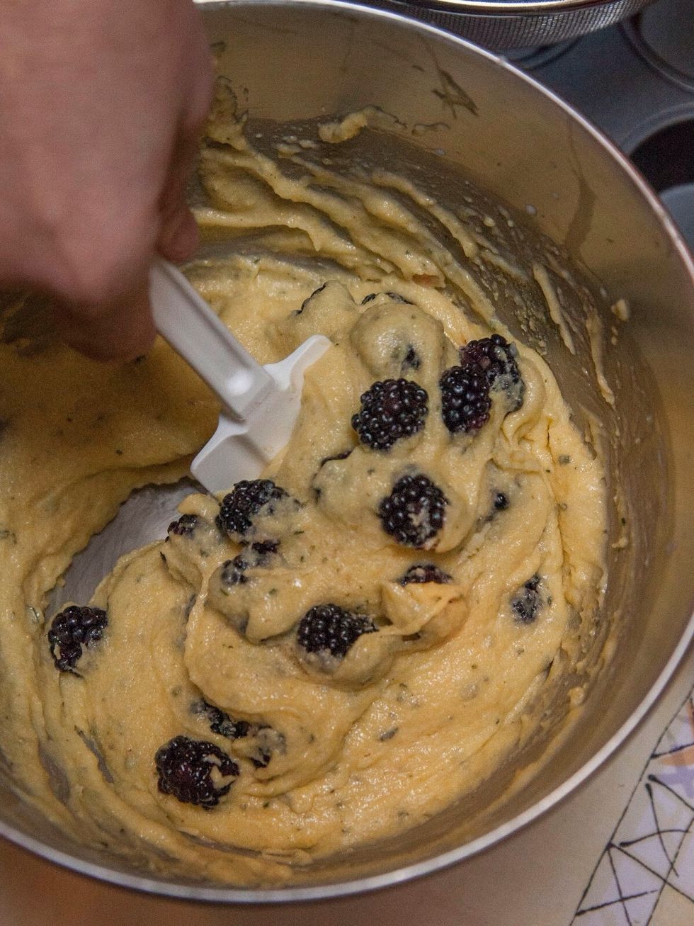Fold them in carefully so you don't mash them.