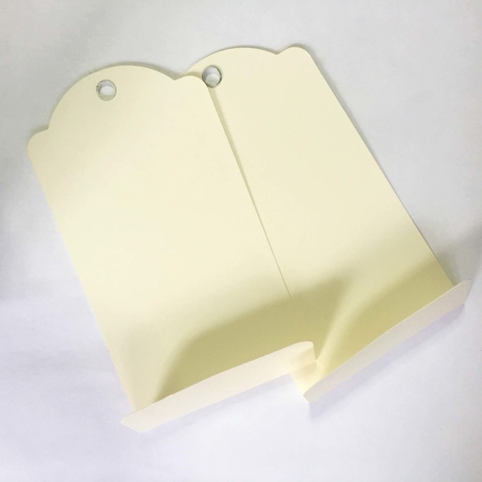 Fold them inwards as shown.