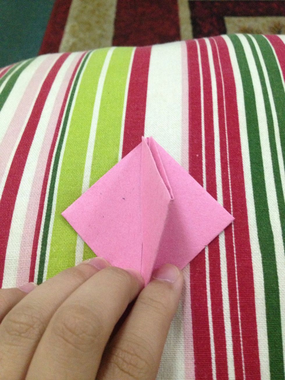 Fold this upper right flap to the left side.