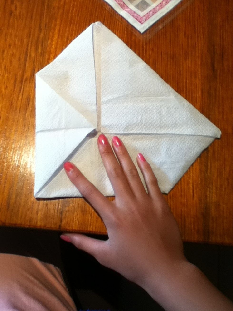 Fold those corners in again (the corners of which you just folded).