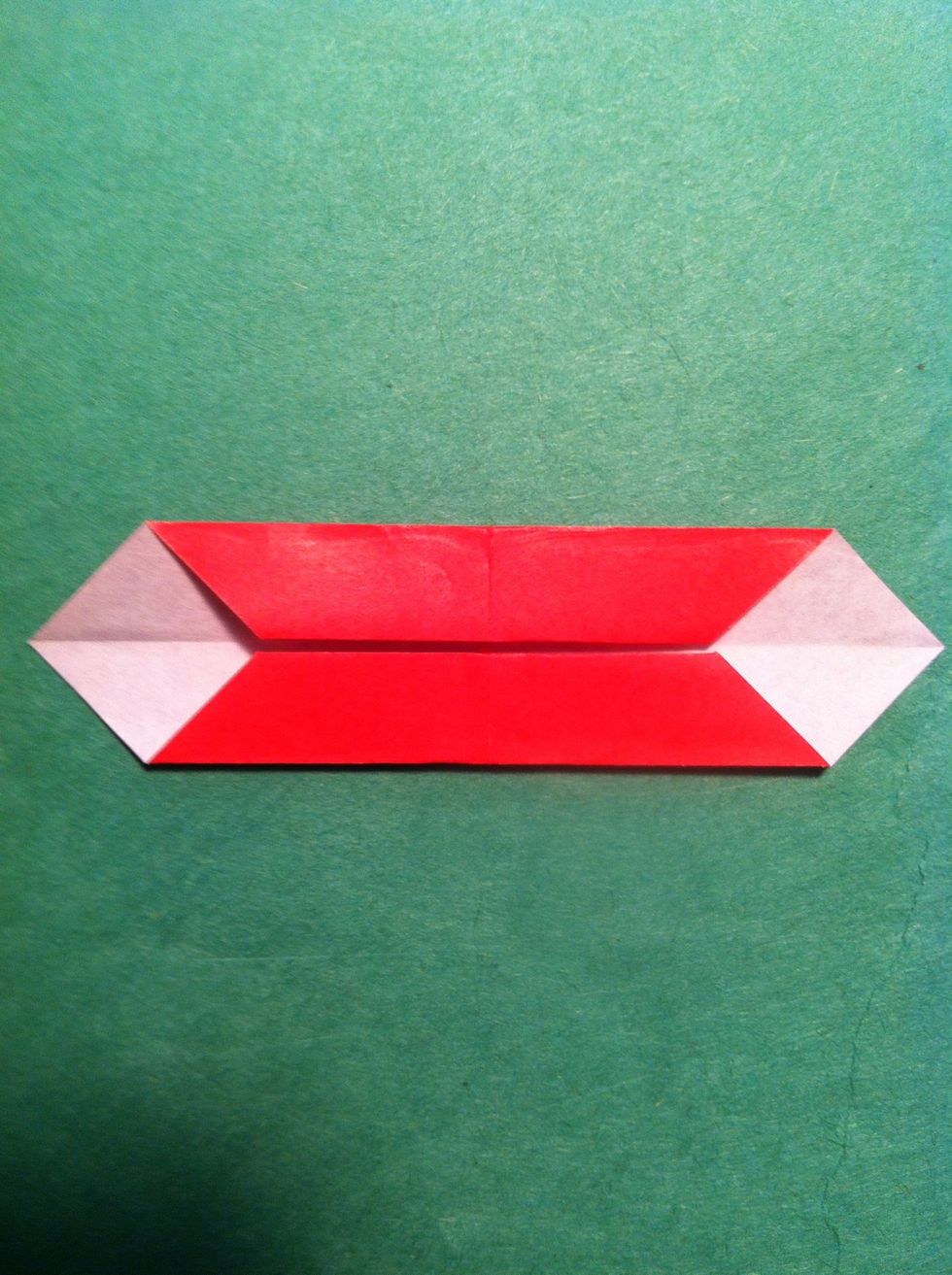 Fold to the center again.