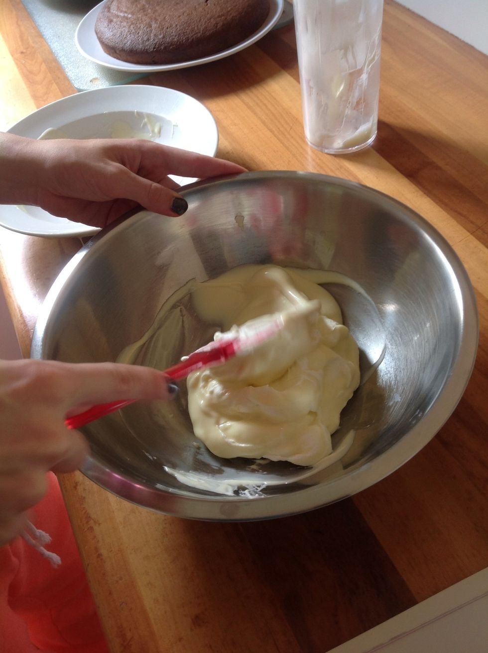 Fold together the sipped cream and melted chocolate