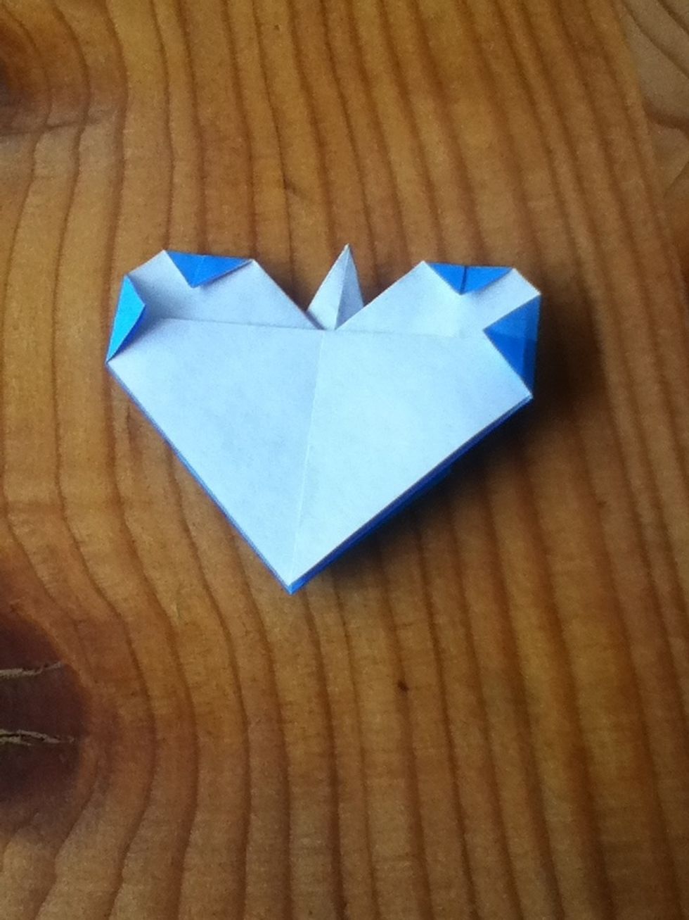 Fold top and sides down to round off the edges