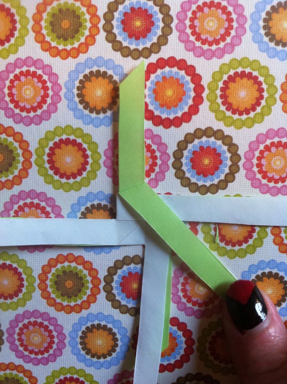 Fold top down diagonally.