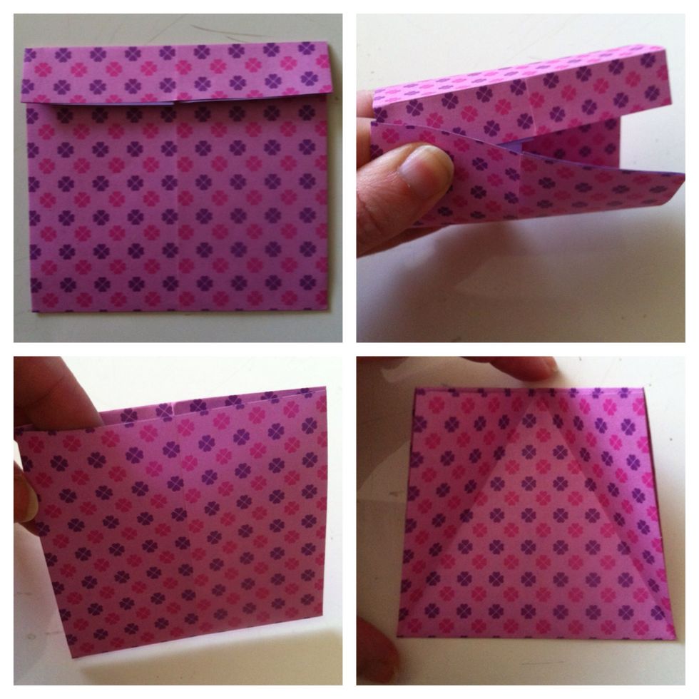 Fold top edge down & tuck inside front flap. You can stick finger in cuz this is going to be opening of box. Fold top left & right corner to center. It forms upside down "v".