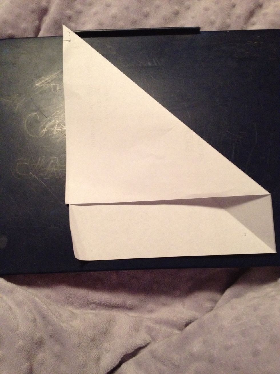 Fold top right corner in.