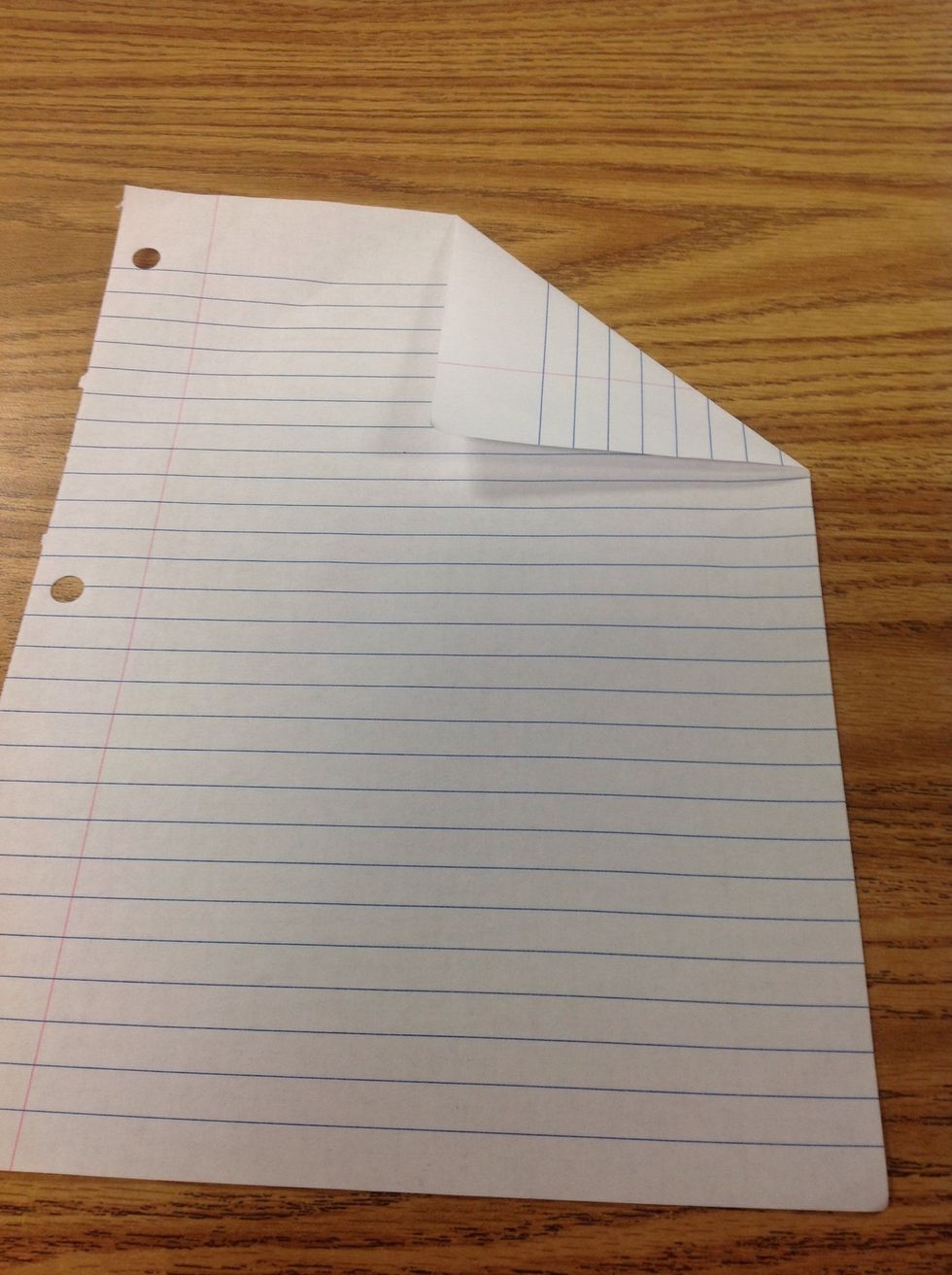 Fold top right corner towards the center