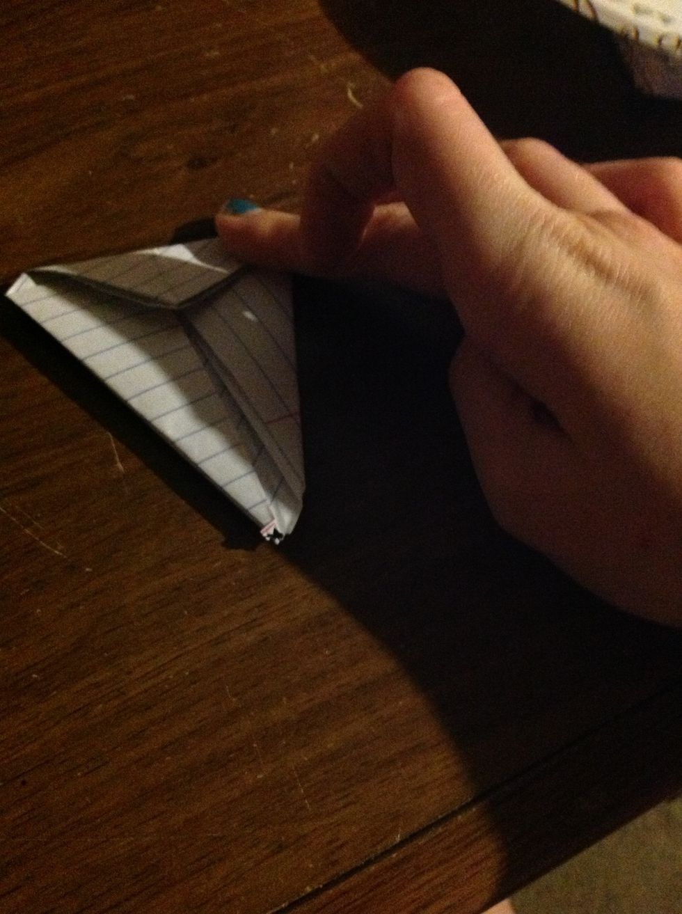 Fold top triangle down.