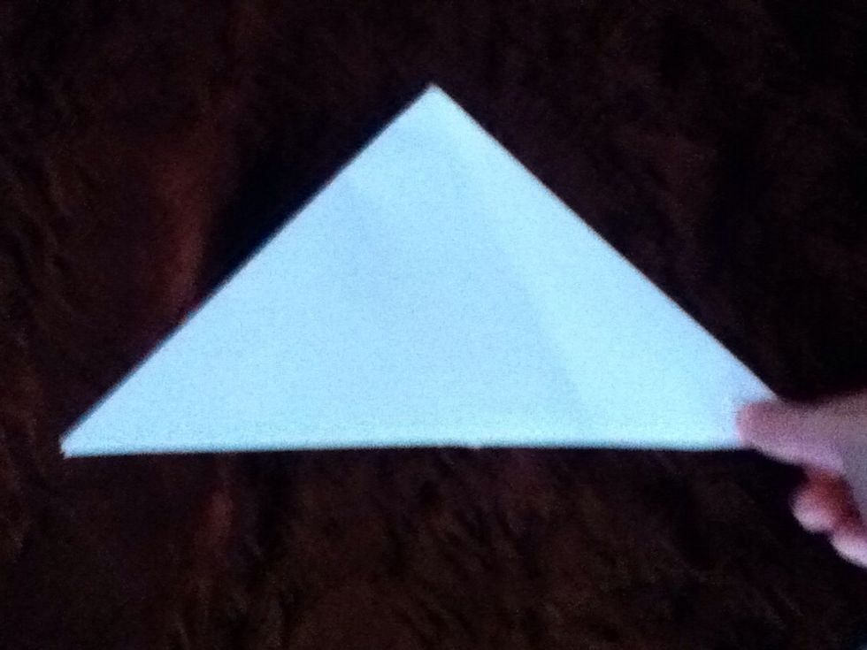 Fold twice to make a smaller triangle