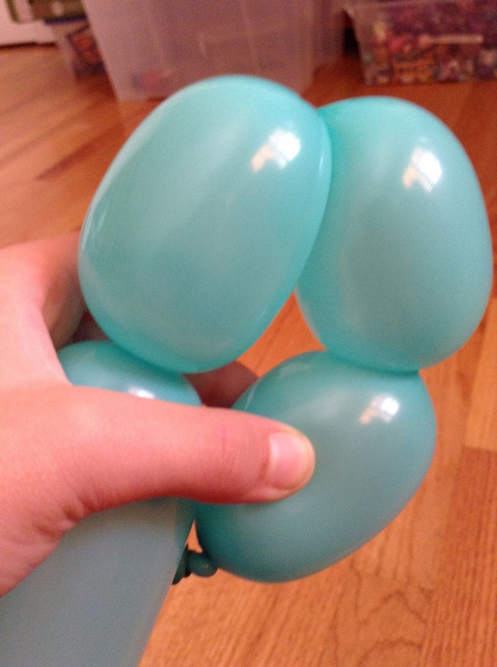 Fold two more "bubbles" about the same size, these are the ears