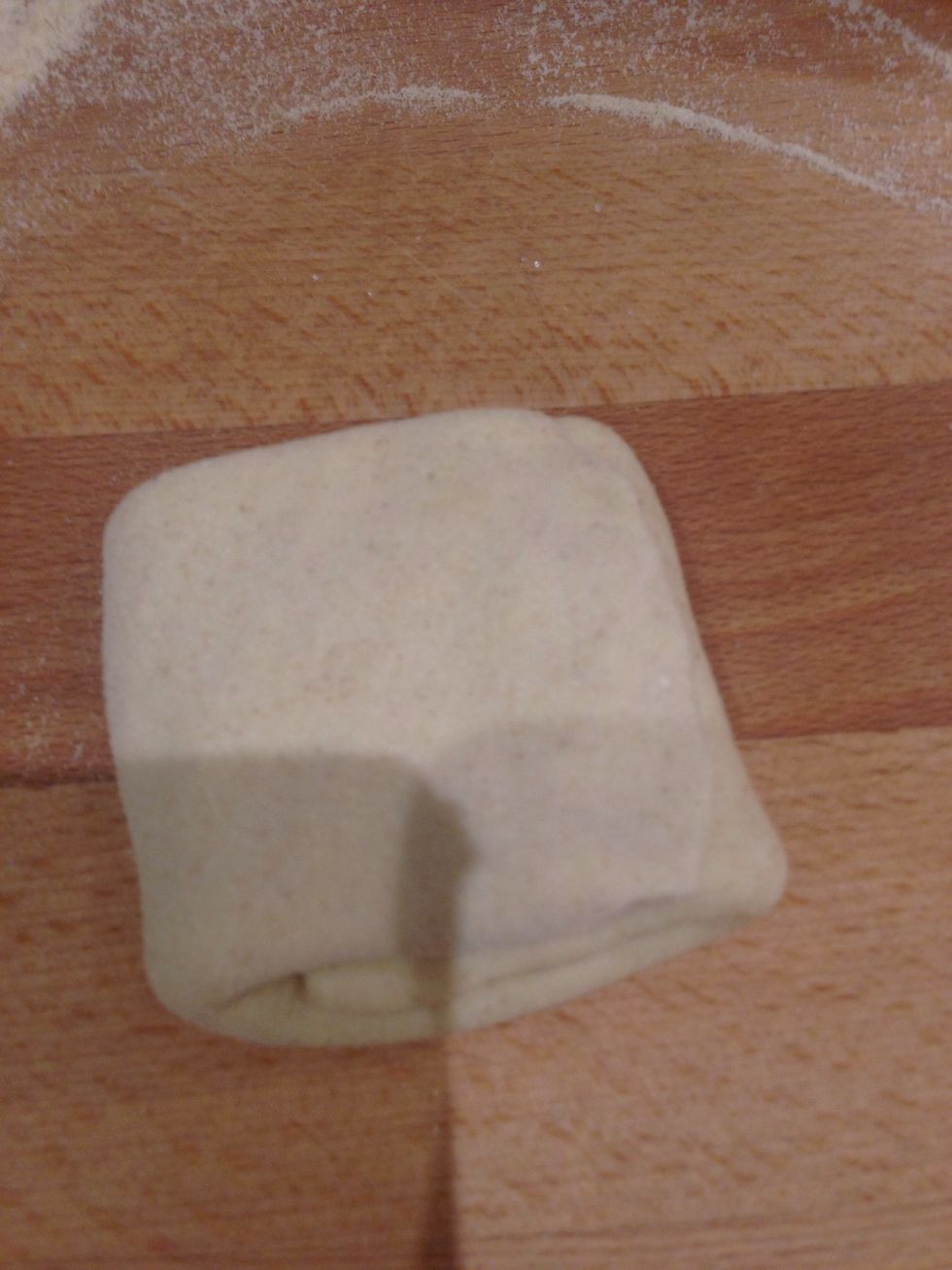 Fold two sides in, then the opposite sides to form a square