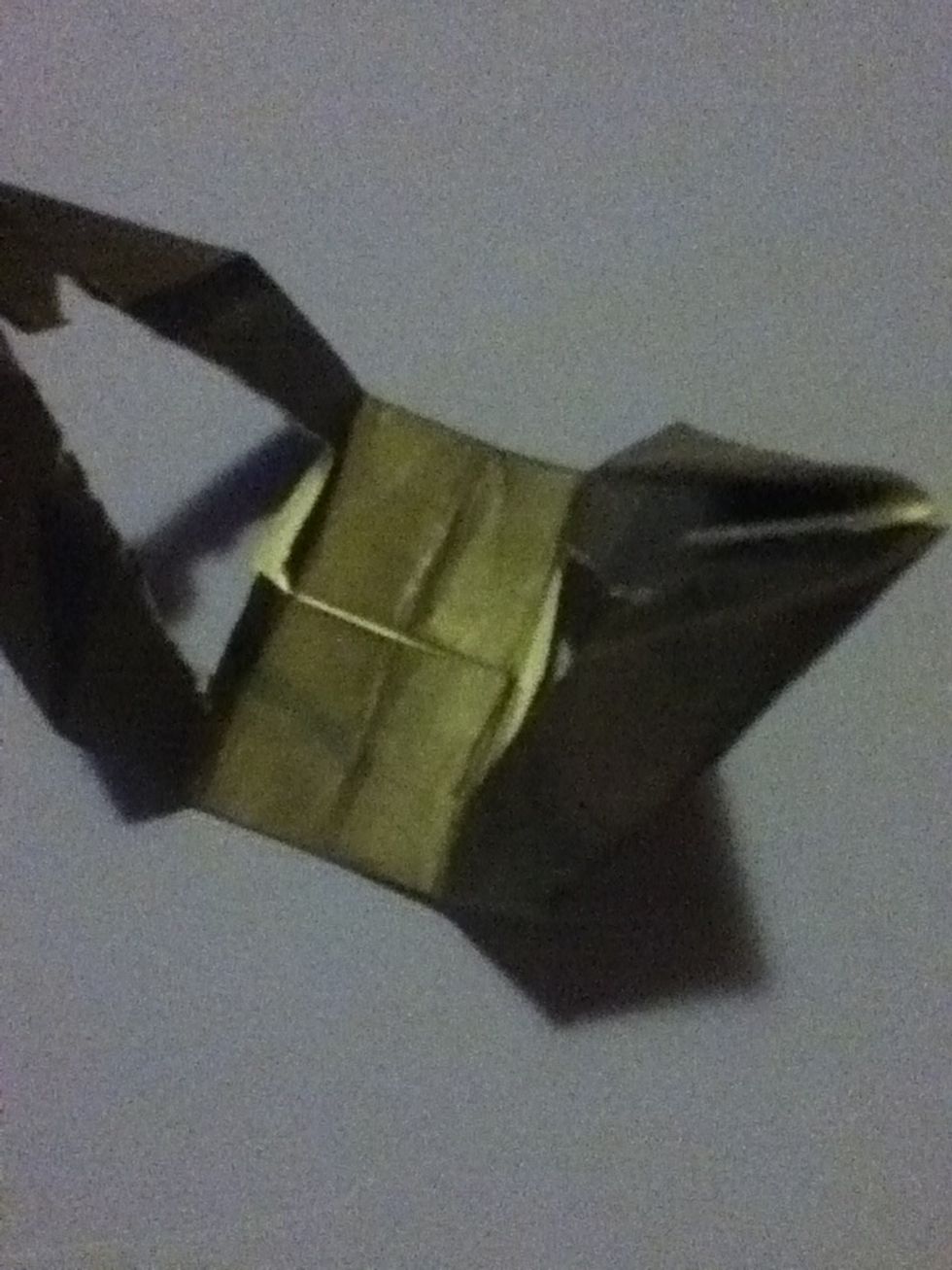 Fold up on that crease you made before