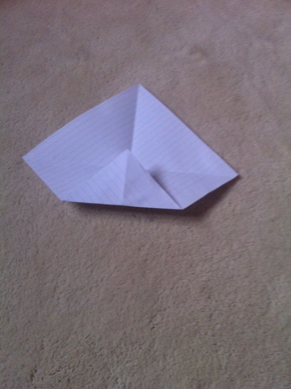 Fold up the bottom corner to the centre