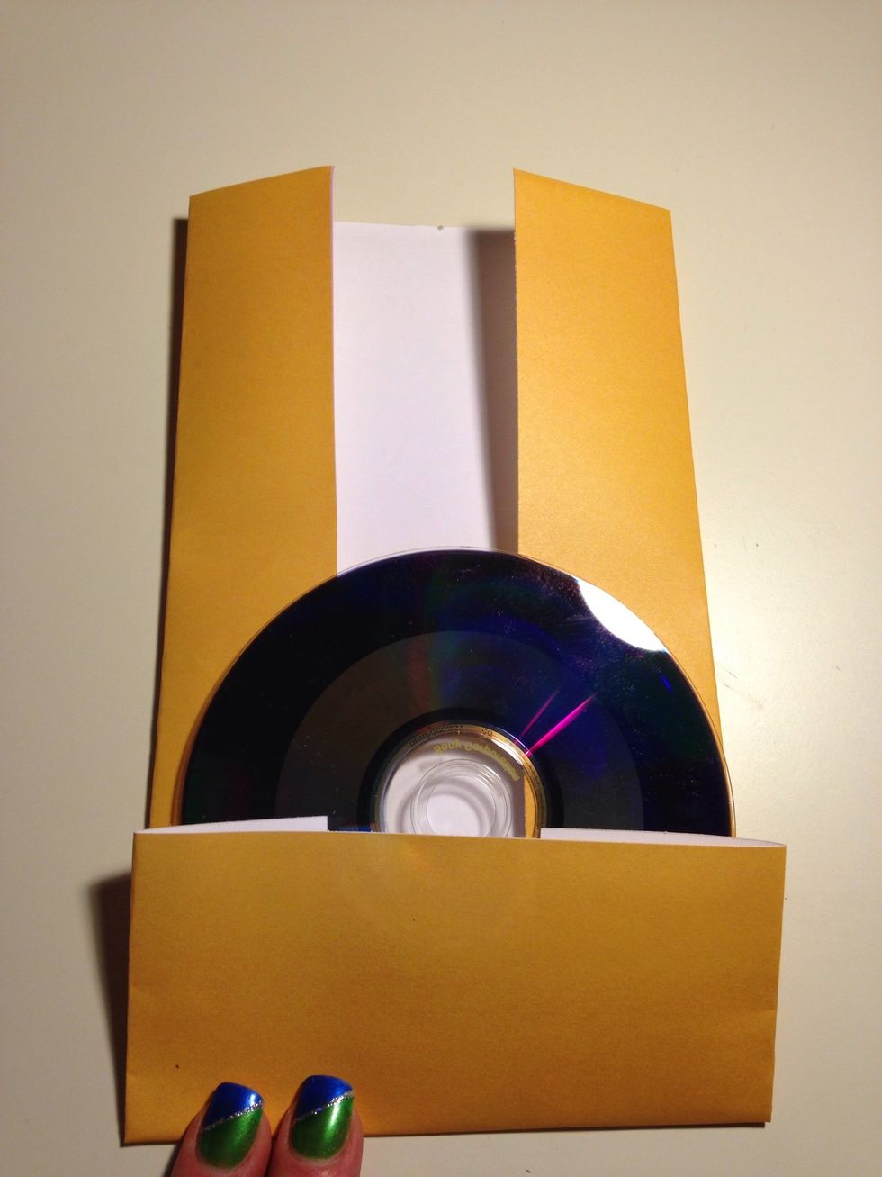 Fold up the bottom half to about the middle of the disc.