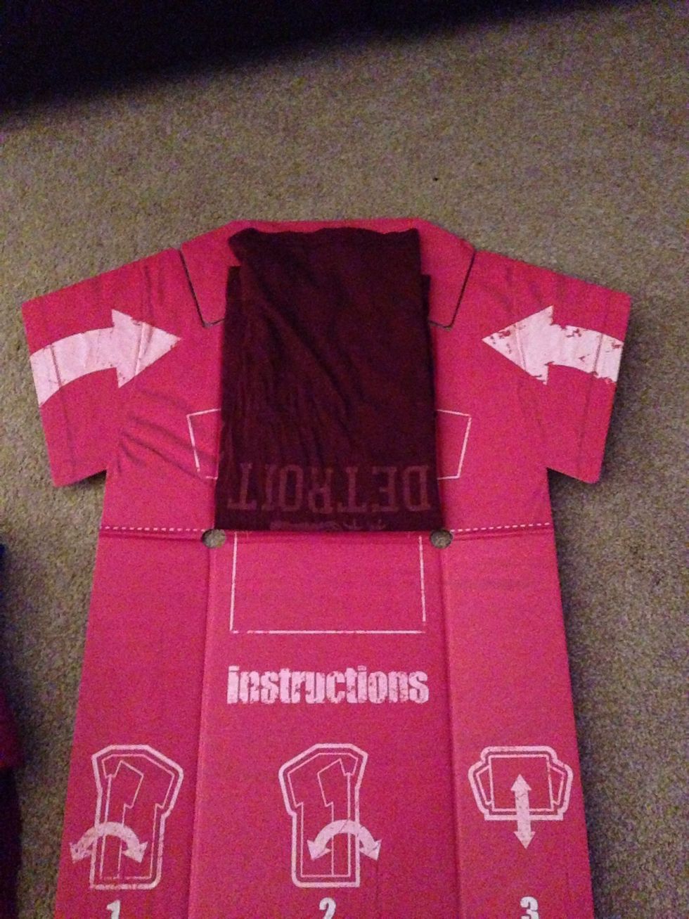 Fold up the bottom of the T-Shirt Folder.