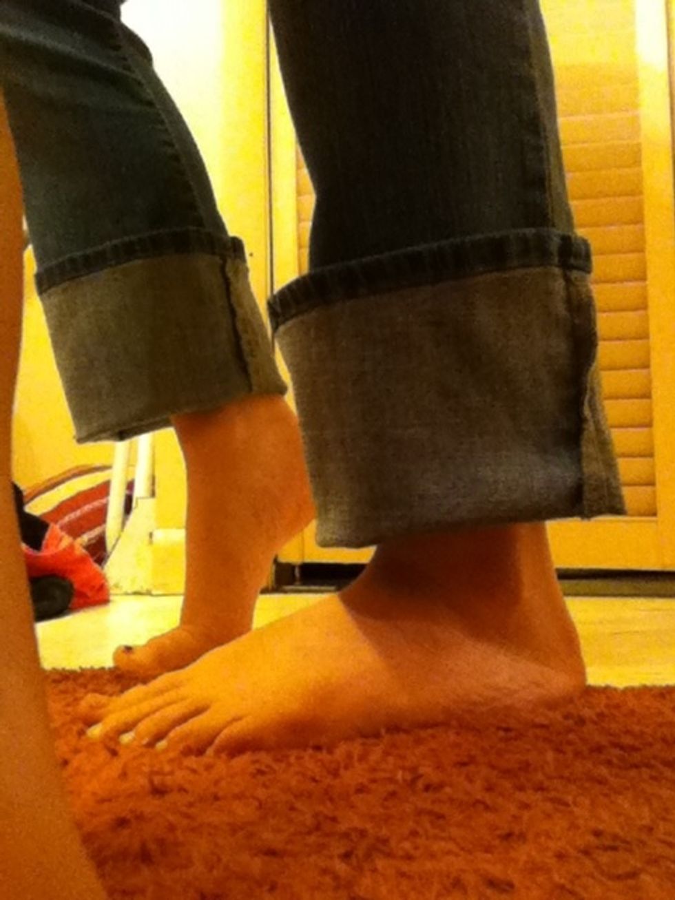 Fold up the bottom of your jeans