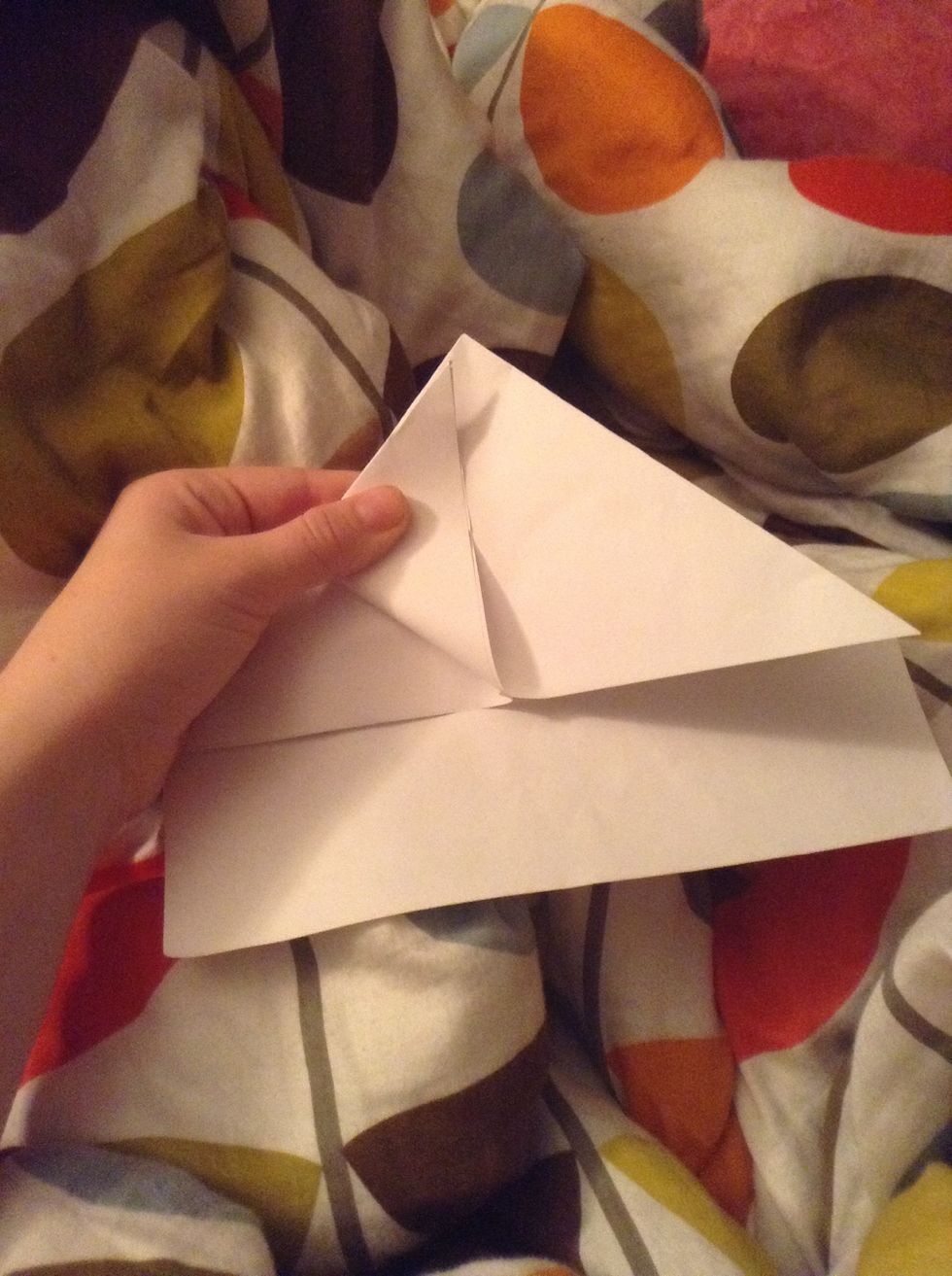 Fold up the excess corners up to look like legs