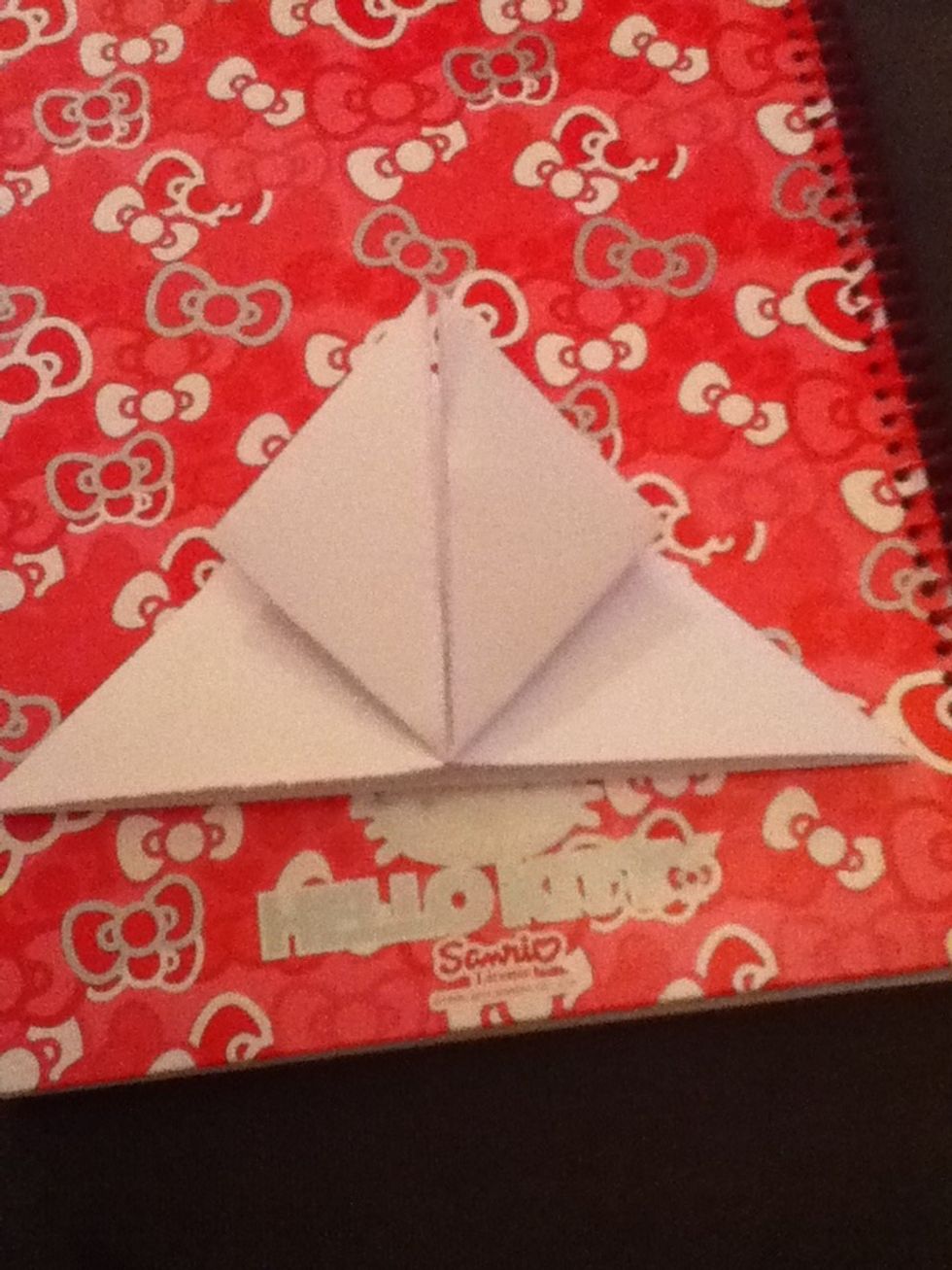 Fold up the top layer corners up to the centre line