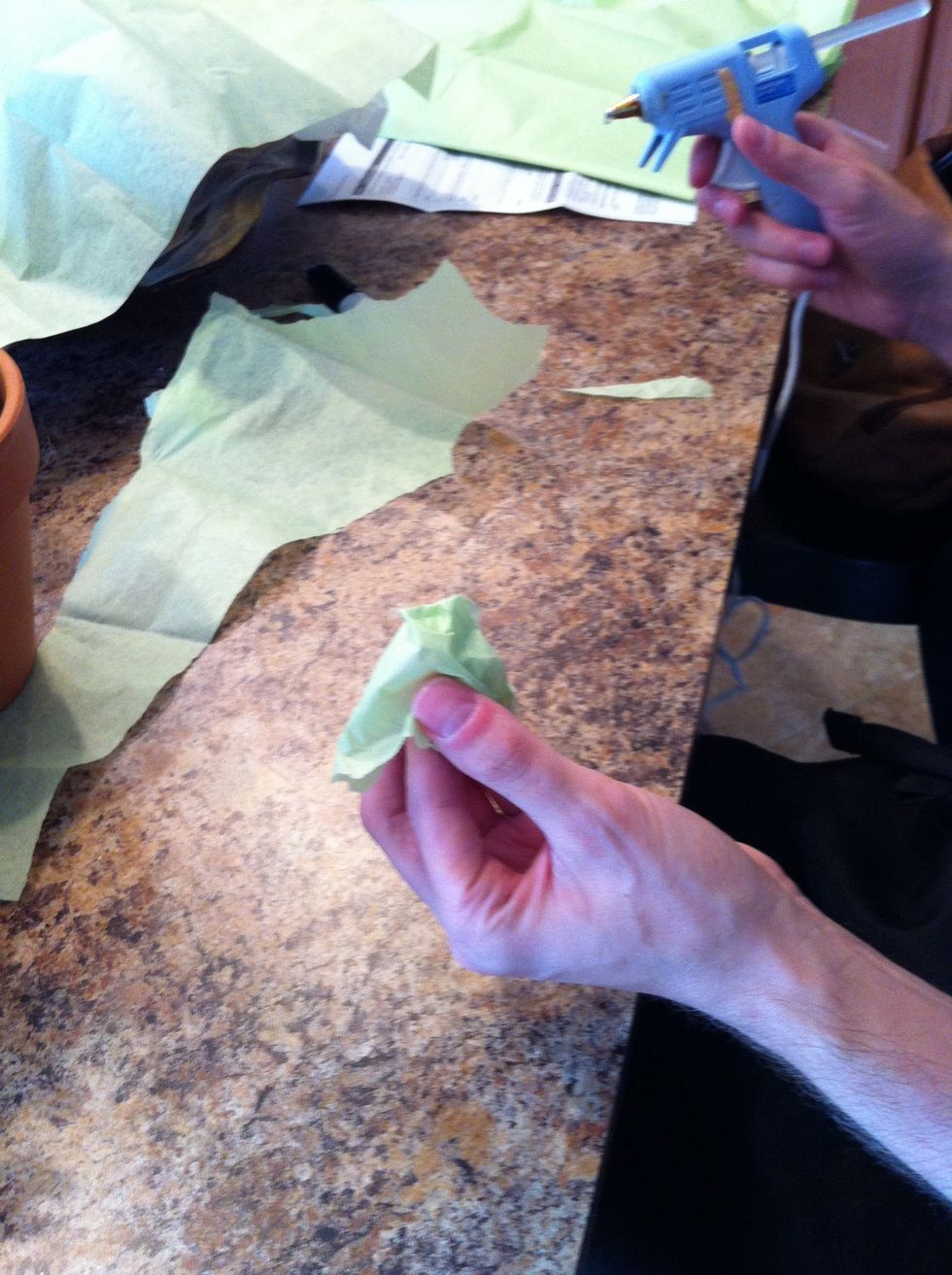 Fold up tissue over your finger