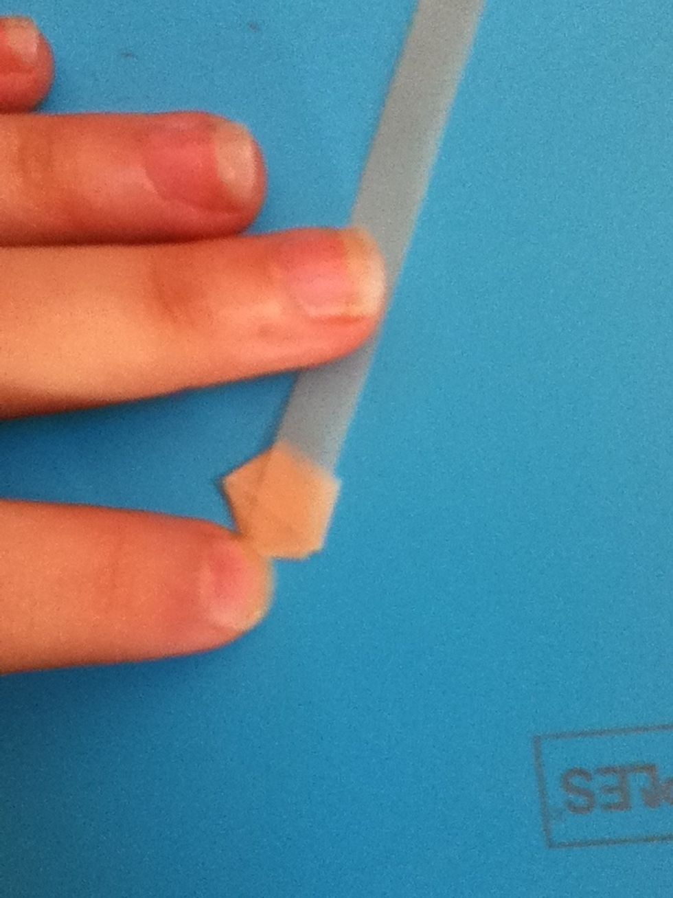 Fold up to the right. Make sure these folds stay tight.